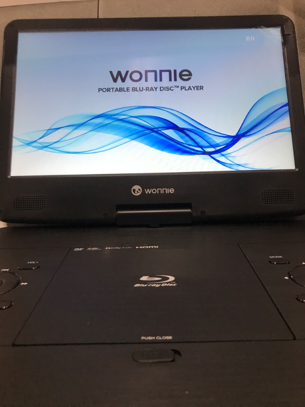 Photo 3 of WONNIE 16.9" Portable Blu ray DVD Player with 14.1" 1080P HD Swivel Screen, 4-Hour Rechargeable Battery, Supports HDMI Output, Surround Audio, Last Memory, USB/SD Card, AV in