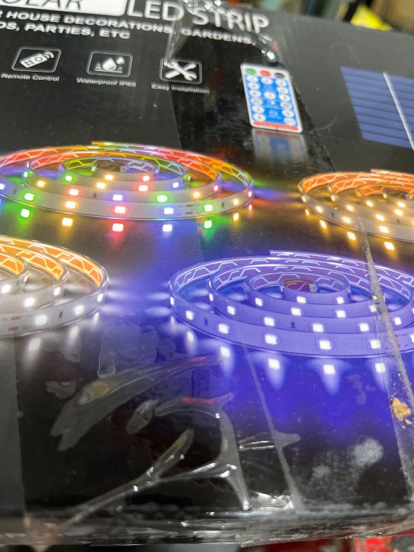 Photo 1 of Solar LED Strip Lights Outdoor, 32.8ft 560 LEDs, Solar Powered Blue Light LED Strip with 8 Lighting Modes IP67 Waterproof 2835 SMD Rope Lights for Garden Trees Christmas Party Decor