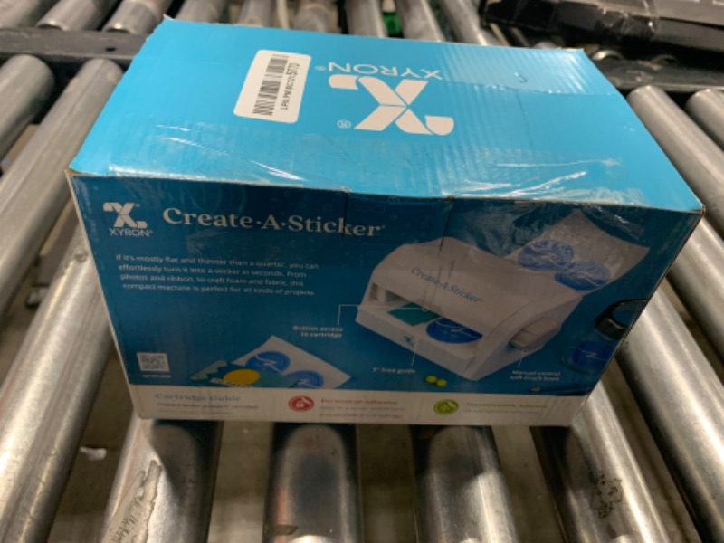 Photo 1 of Xyron Create-a-Sticker, 5" Sticker and Label Maker Machine for Small Business and DIY Crafts, Includes Permanent Adhesive, Pre-Loaded (0501-05-10A), 9.055" x 5.709" x 5.906"