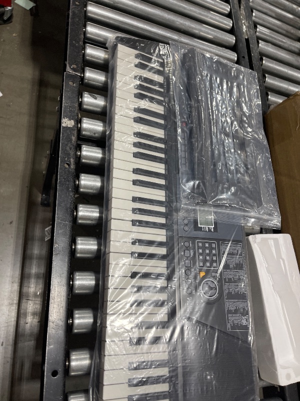 Photo 1 of The ONE Smart Keyboard COLOR 61 Lighted Keys Piano Keyboard, Electric Piano for Beginners with 256 Tones, 64 Polyphony, Built-in LED Lights and Free Apps (Black)