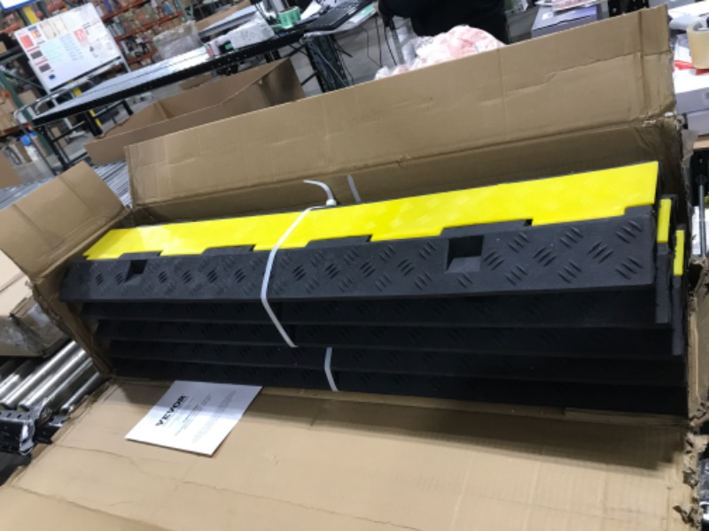 Photo 1 of VEVOR Cable Protector Ramp, 5 Packs 2 Channels Speed Bump Hump, Rubber Modular Speed Bump Rated 11000 LBS Load Capacity, Protective Wire Cord Ramp Driveway Rubber Traffic Speed Bumps Cable Protector