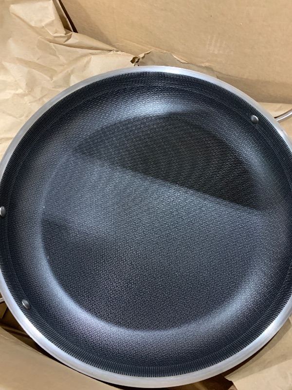 Photo 1 of DELARLO Paella Pan 14 Inch Tri-Ply Stainless Steel Paella Pan with Lid Nonstick Frying Pan, Hybird Induction Large Skillets,Great for Paella Parties Indoors Outdoors,Heavy Duty Style