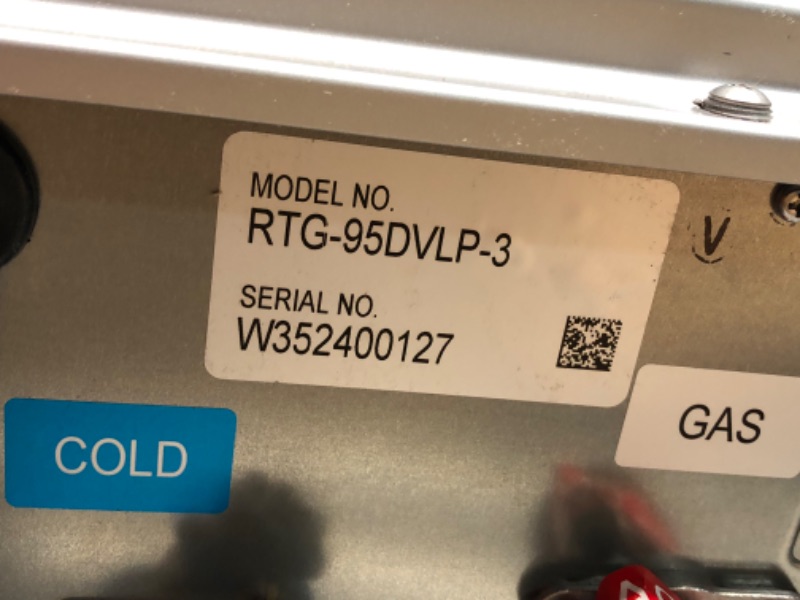 Photo 3 of ***HEAVILY USED - COVERED IN DENTS - LCD BROKEN - UNABLE TO TEST - SEE PICTURES - LIKELY MISSING PARTS***
Rheem RTG-84DVLN-3 High Efficiency Non-Condensing Indoor Tankless Natural Gas Water Heater, 8.4 GPM