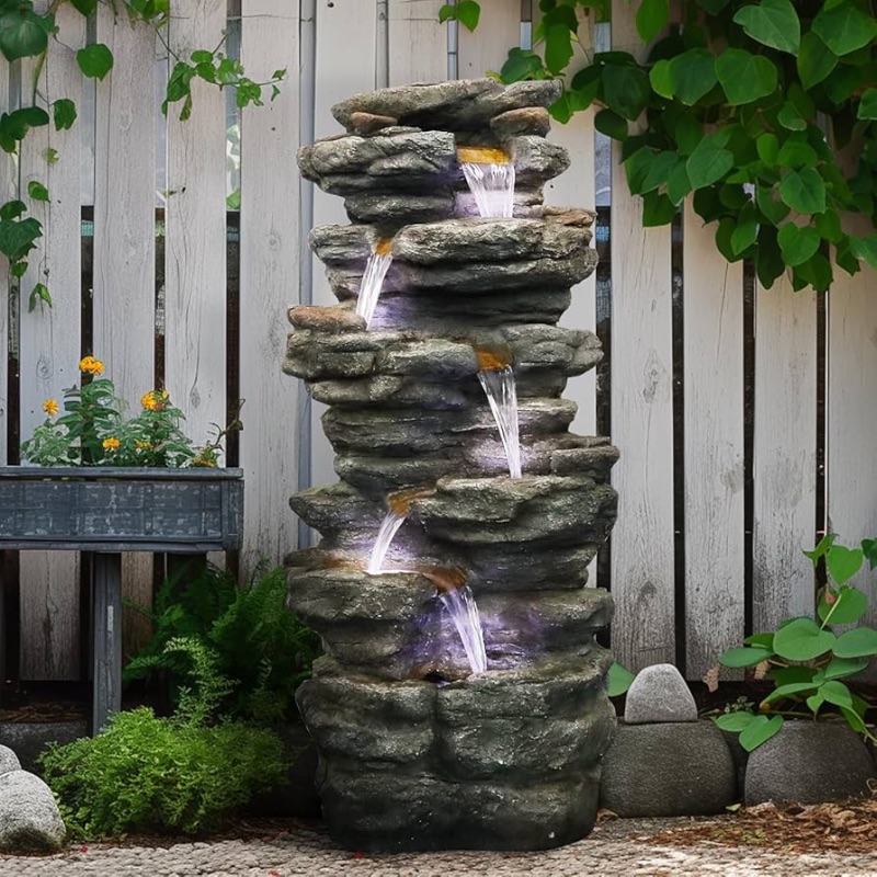 Photo 1 of ***FACTORY SEALED*** SunJet 40" High 6-Tiers Cascading Rock Outdoor Water Fountain with LED Lights - Large Outdoor Fountains and Waterfalls for Garden or Patio, Yard, and Deck Decor, Featuring Natural Stone Look