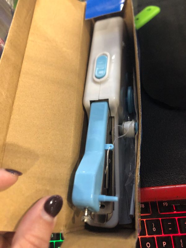 Photo 1 of  Stitch Sew Quick Portable Mending Machine - Single Thread Machine for Quick Repairs