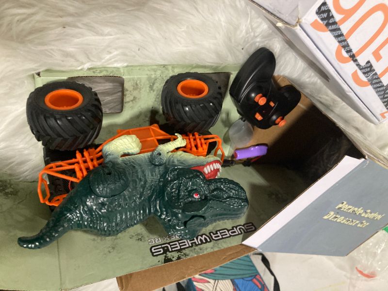 Photo 1 of Bennol Remote Control Dinosaur Car, 2.4Ghz RC Truck for Toddlers, Electric Hobby RC Car Toys with Light & Sound Spray Birthday Gift for 3 4 5 6 7 8 Year olds Kids Boys Girl ****missing battery****