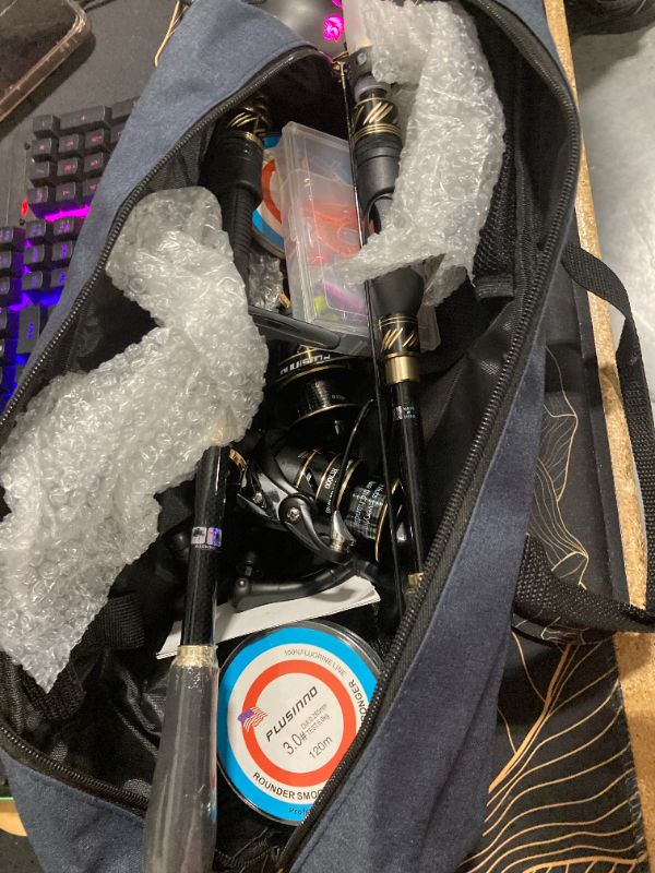 Photo 1 of PLUSINNO Fishing Pole, Fishing Rod and Reel Combo,Telescopic Fishing Rod Kit with Spinning Reel, Collapsible Portable Fishing Pole with Carrier Bag for Freshwater Saltwater Fishing Gifts for Men Women