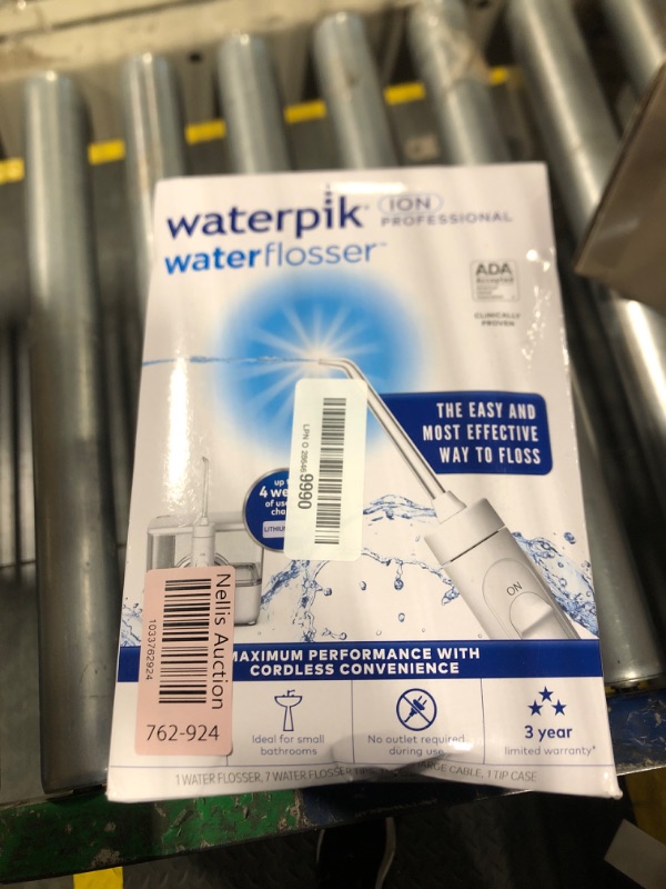 Photo 1 of Waterpik ION Professional Water Flosser, Rechargeable and Portable for Teeth, Gums, Braces, 10 Settings, 7 Flossing Tips For Multiple Users And Needs, ADA Accepted, WF-12 White, Packaging May Vary