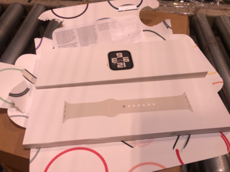 Photo 1 of Apple Watch SE (2nd Gen) [GPS 40mm] Smartwatch with Starlight Aluminium Case with Starlight Sport Band S/M. Fitness and Sleep Trackers 