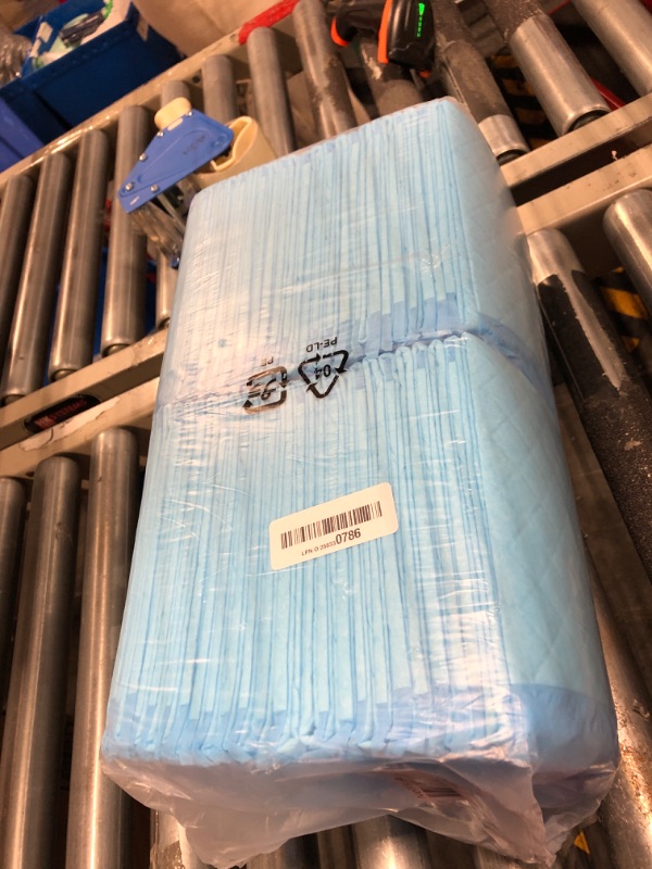 Photo 1 of Amazon Basics Dog and Puppy Pads