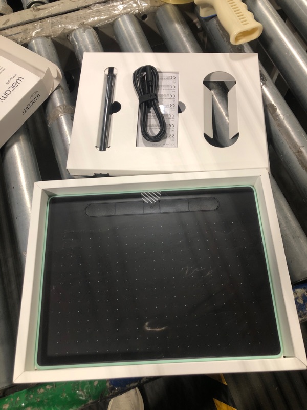 Photo 1 of Wacom Intuos Medium Bluetooth Graphics Drawing Tablet, Portable for Teachers, Students and Creators, 4 Customizable ExpressKeys, Compatible with Chromebook Mac OS Android and Windows - Pistachio