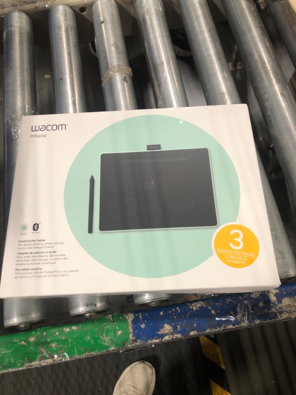 Photo 1 of Wacom Intuos Medium Bluetooth Graphics Drawing Tablet, Portable for Teachers, Students and Creators, 4 Customizable ExpressKeys, Compatible with Chromebook Mac OS Android and Windows - Pistachio