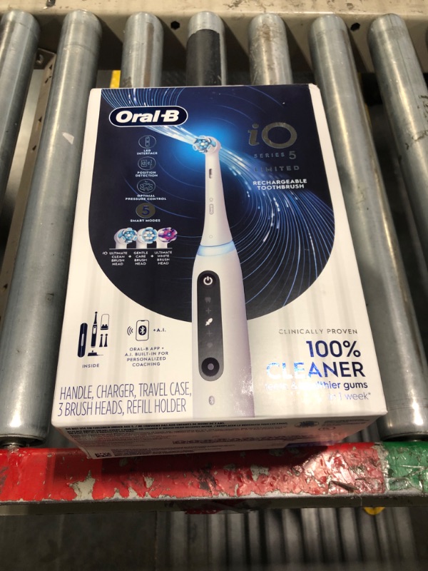 Photo 1 of Oral-B iO Deep Clean + Whiten Rechargeable Electric Toothbrush with Visible Pressure Sensor, 2 Minute Timer, 5 Cleaning Settings, 1 iO5 Limited, 3 Toothbrush Heads, Travel Case & Refill Holder, White