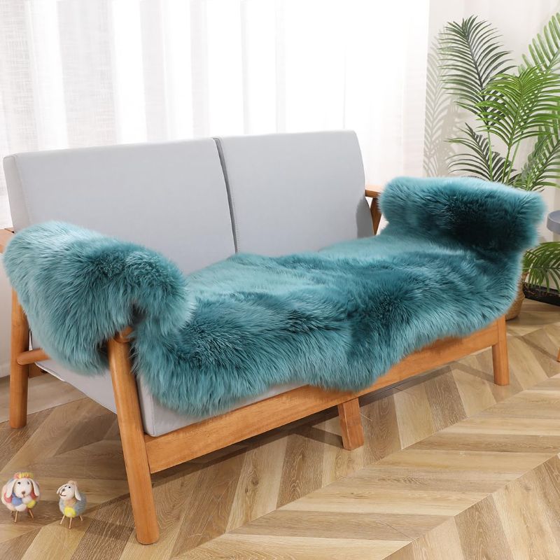 Photo 1 of ***new, in factory packing*** Soft Genuine Fluffy Sheepskin Rug, Cozy Wool Shaggy Fur Area Rug Carpet for Bedroom Living Room Decors Sofa Chair Couch Bench Cover Pet Dog Pray Cushion(2ftX6ft, Peacock Blue)