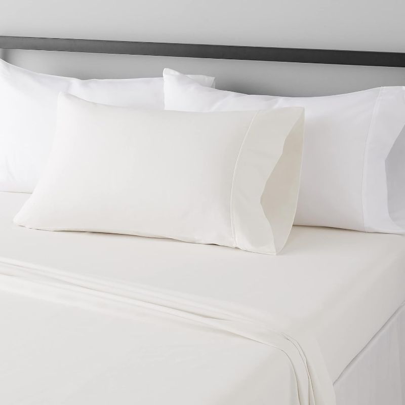 Photo 1 of Amazon Basics Lightweight Super Soft Easy Care Microfiber 3 Piece Bed Sheet Set with 14-Inch Deep Pockets, Twin XL, Cream, Solid
