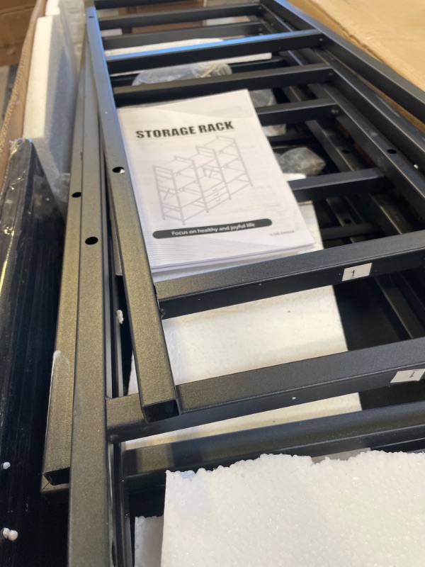 Photo 1 of YAOHUOO Triple Bookshelf with 3 Fabric Drawers, 4 Tier Wide Bookcase with Open Display Shelves, Small Bookshelf with Storage for Home Office & Bedroom, Rustic Brown