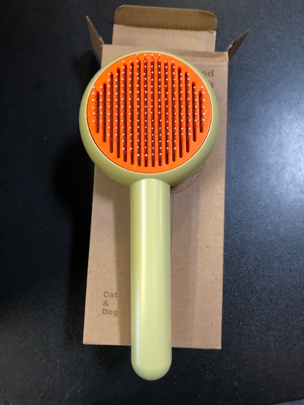 Photo 2 of HICC GROOM! Pet Grooming Brush for Cats and Dogs, Self-Cleaning Sliker Brush for Removes Mats, Tangles, and Loose Hair, Shedding Brush for Short or Long Haired Cats/Dogs (Donut)