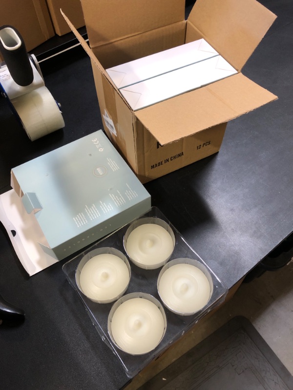 Photo 1 of Floating Candles 3 inch Flicker LED Floating Wax Candles Flameless Batteries Tea Lights Water Activated for Home Wedding Party Centerpiece Vases Outdoor Swimming Pool Pond Decor (Warm White, 12 Pack)