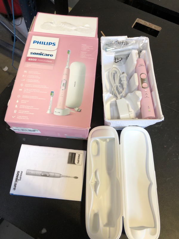 Photo 2 of PHILIPS Sonicare ProtectiveClean 6500 Rechargeable Electric Power Toothbrush with Charging Travel Case and Extra Brush Head, Pink, HX6462/06