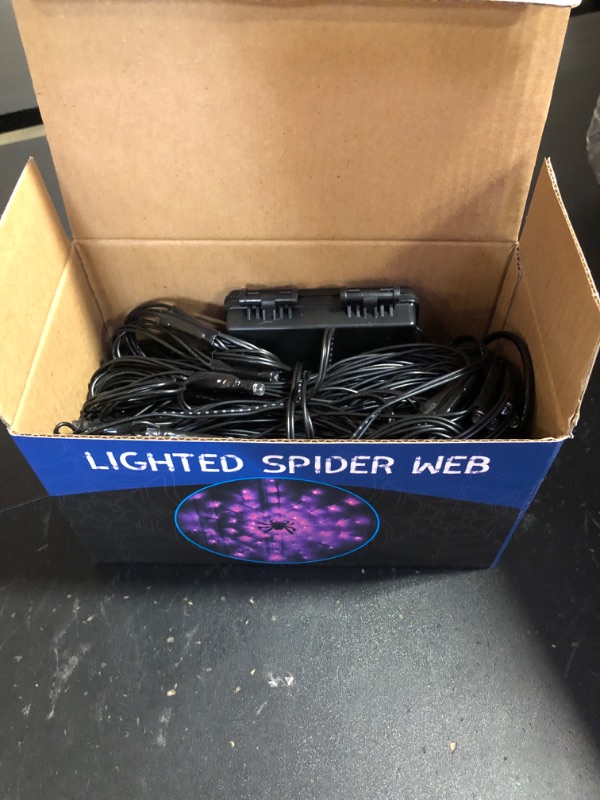 Photo 2 of FUNPENY Halloween 80 LED Spider Web Lights with Spider, Battery Powered 8 Modes Light up Cobweb Halloween Decorations for Indoor Ourdoor Garden Yard Home Patio (Purple)