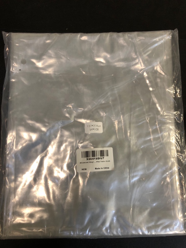 Photo 1 of Aironment 100% Waterproof PVC Tablecloth, Clear Plastic Table Protector Oil and Spill Proof Selected Vinyl Rectangle Table Cloth Cover for Dining, Parties, Camping ?54" x 108" Clear