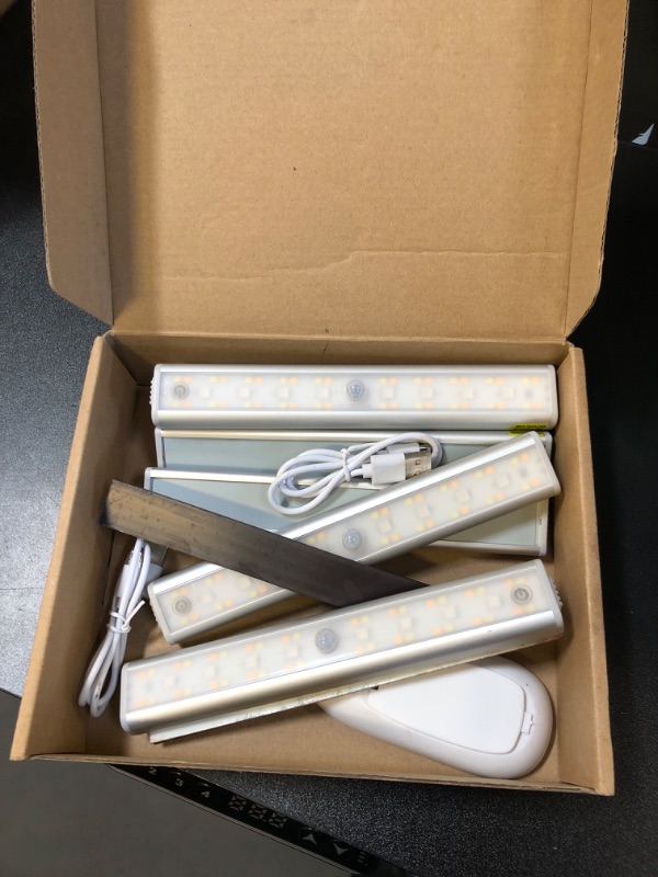 Photo 1 of Under Cabinet Lighting Wireless with Remote, 48 LED Rechargeable Under Cabinet Lights, Kitchen Counter Lights Dimmable LED Closet Lights RGB Bar for Shelf, Car, Hallway, 15 Color Changing, 6 Pack