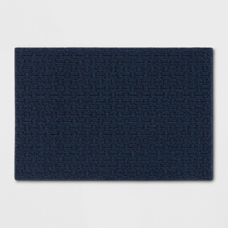 Photo 1 of 1'8"X2'6" Washable Solid Machine Tufted Accent Rug Blue - Threshold™