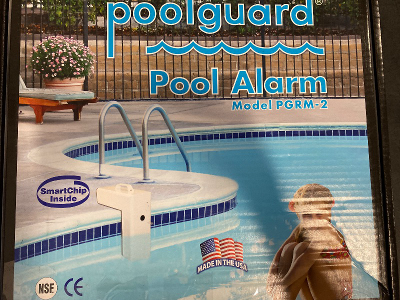 Photo 1 of Pgrm-2 Pool Guard Ig Pool Alarm in-house remote receiver that has a range up to 200 ft Battery Powered 12 volt power supply audible New - red reset sleep key battery powered
