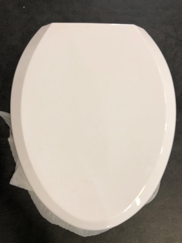 Photo 1 of Premium Elongated Toilet Seat with Cover Quiet Close, Two-Click to Quick Release, Easy Installation Never Loosen Hinge, Slow Close Toilet Seat and Cover, Easy Cleaning-White Color (Elongated)
