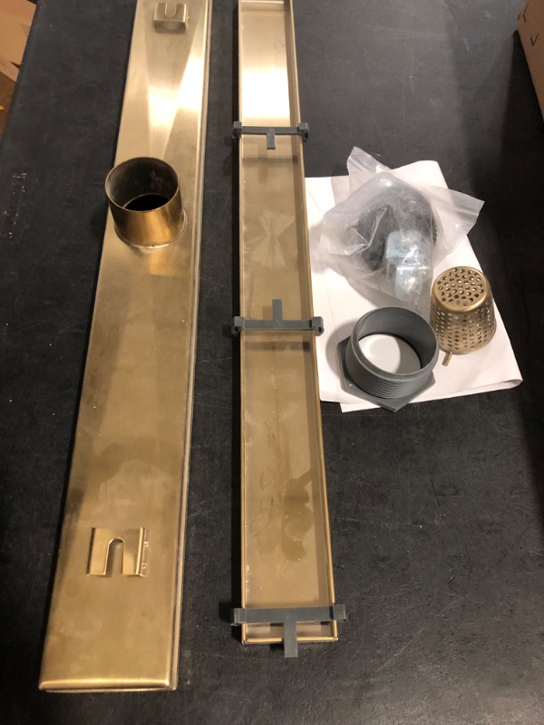 Photo 1 of Linear Shower Floor Drain, Brushed Gold 24 Inch 304 Stainless Steel Bathroom Drains Kit, Rectangular Shower Trench Drain with Reversable Tile-in Pattern Drain Cover & Hair Catcher