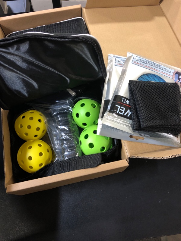 Photo 2 of Premium Pickleball Paddles Set | Carbon Fiber Paddles | Fiberglass Face with Polypropylene Honeycomb Core | Anti-Slip Sweat-Absorbing Grip | 2 Paddles, 4 Balls, Bag, Towels & Pickers | CAZMEER