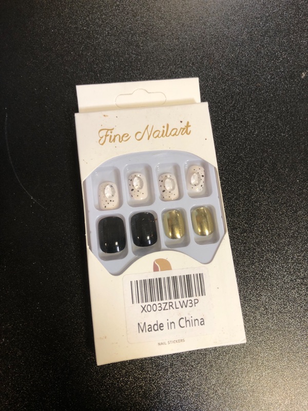 Photo 2 of Rilafuvu 24Pcs Short Press on Nails Black Glue on Nails Gold Stick on Nails White Acrylic Nails French Fake Nails Glossy False Nails