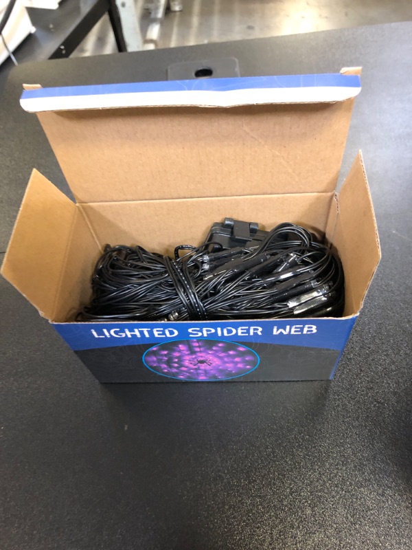 Photo 2 of FUNPENY Halloween 80 LED Spider Web Lights with Spider, Battery Powered 8 Modes Light up Cobweb Halloween Decorations for Indoor Ourdoor Garden Yard Home Patio (Purple)