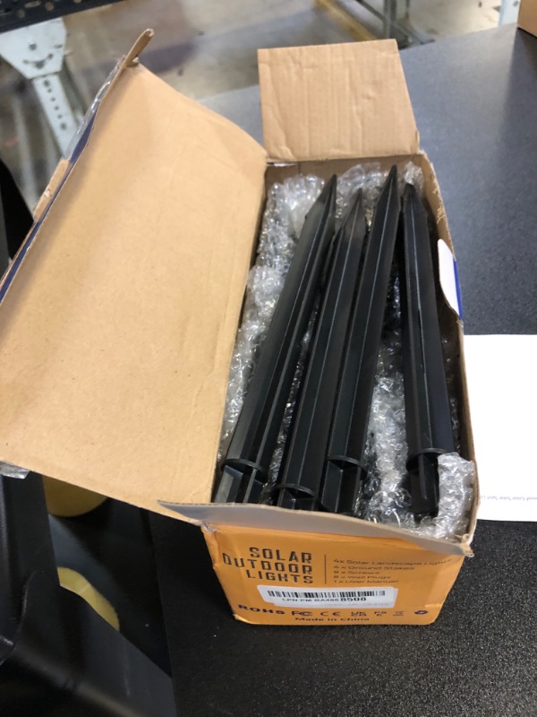 Photo 1 of Kyosho Color Changing Solar Outdoor Lights, 9 Lighting Modes Halloween Christmas Lights, Waterproof Color Solar Spot Lights Outdoor, RGBW Multicolor Solar Spotlight Tree Pool Garden Lights, 4 Pack