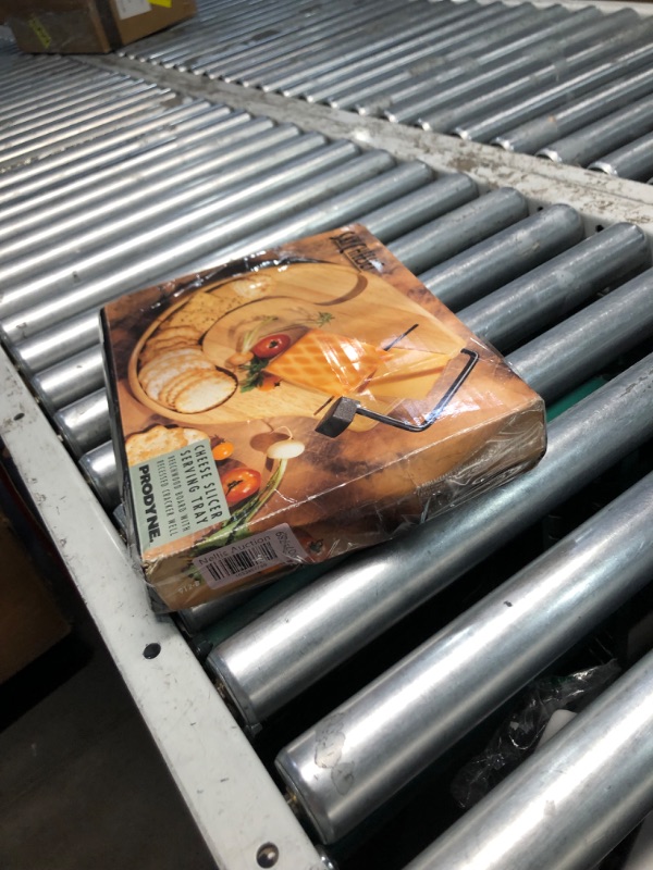 Photo 2 of **MAJOR DAMAGE CUTTING WIRE BROKEN**
Prodyne Cheese Slicer/Tray with Cracker Well