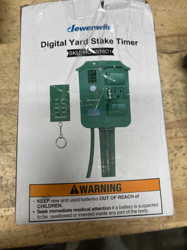 Photo 1 of DEWENWILS Outdoor Power Stake Timer Waterproof, 100FT Wireless Remote Control, 6 Grounded Outlets, 6FT Extension Cord, Photocell Dusk to Dawn for Lights, Garden, UL Listed