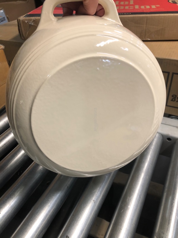 Photo 4 of ***(MINOR DAMAGE/ SEE NOTES)***
Amazon Basics Cast Iron Dutch Oven Pot with Lid, Enameled, Round, Dual Handles, Heavy-Duty, Medium, 6-Quart, White