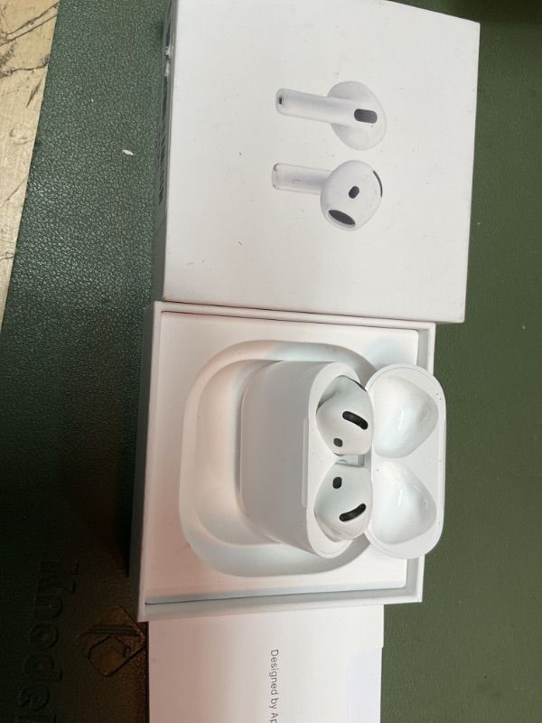 Photo 3 of Apple AirPods 4 Wireless Earbuds, Bluetooth Headphones, Personalized Spatial Audio, Sweat and Water Resistant, USB-C Charging Case, H2 Chip, Up to 30 Hours of Battery Life, Effortless Setup for iPhone