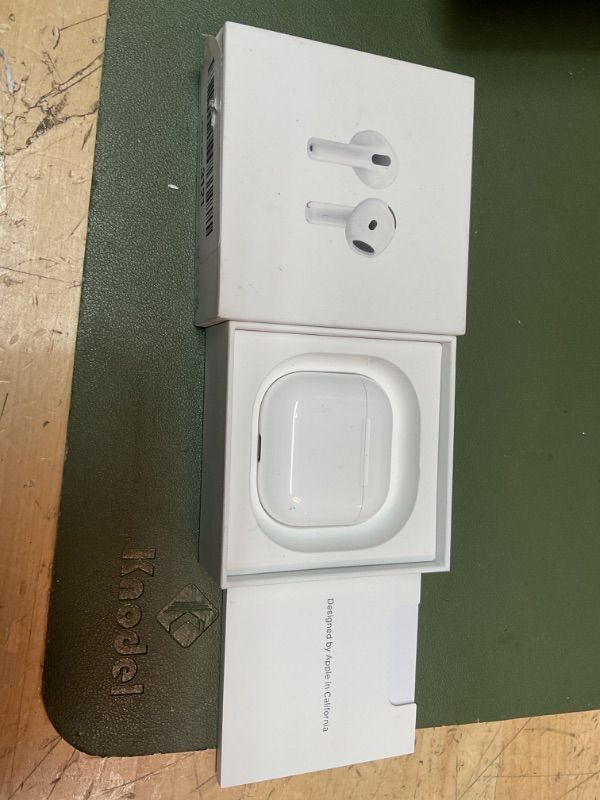 Photo 2 of Apple AirPods 4 Wireless Earbuds, Bluetooth Headphones, Personalized Spatial Audio, Sweat and Water Resistant, USB-C Charging Case, H2 Chip, Up to 30 Hours of Battery Life, Effortless Setup for iPhone