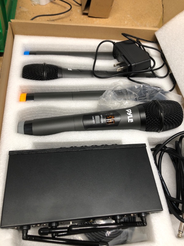 Photo 1 of Pyle UHF Wireless Microphone System - PA Public Address Mic System with 4 Handheld Wireless Mics 50 Selectable UHF Channels, Bluetooth Music Streaming for Karaoke-Style Vocals, Battery-Operated