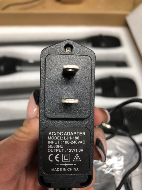 Photo 1 of Pyle UHF Wireless Microphone System - PA Public Address Mic System with 4 Handheld Wireless Mics 50 Selectable UHF Channels, Bluetooth Music Streaming for Karaoke-Style Vocals, Battery-Operated