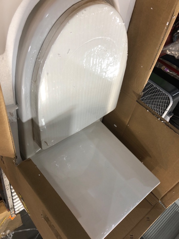 Photo 1 of ***LID TO TANK IS BROCKEN IN HALF*****

Swiss Madison SM-1T254 St. Tropez One Piece Toilet Dual Tornado Flush 0.8/1.28 GPF with Soft Closing Seat, Comfort Height