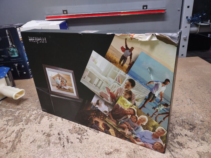 Photo 1 of WiFi Digital Picture Frame 10.1 Inch Smart Digital Photo Frame with IPS Touch Screen HD Display, 16GB Storage Easy Setup to Share Photos or Videos Anywhere via Free Frameo APP (Brown Wood Frame)