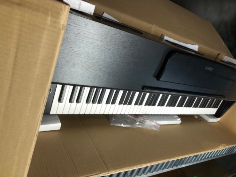 Photo 1 of ***USED - LIKELY MISSING PARTS - UNABLE TO TEST***
Donner DDP-100 88-Key Weighted Action Digital Piano for Beginner Bundle with Piano Keyboard Stand, Power Adapter, Triple Pedals, MP3 Function, USB-MIDI, 2 Headphone Jacks Black