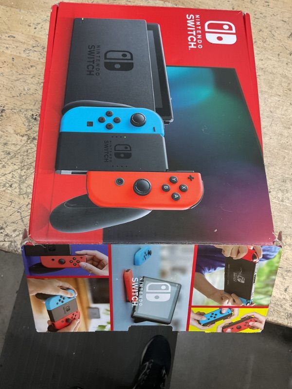 Photo 2 of SEE NOTES **Nintendo Switch™ with Neon Blue and Neon Red Joy™***MISSING JOY STICKS **