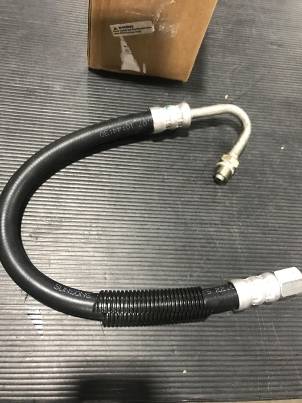 Photo 2 of A/C Suction Hose - Compatible with 1991 - 1993 Jeep Cherokee 4.0L 6-Cylinder 1992