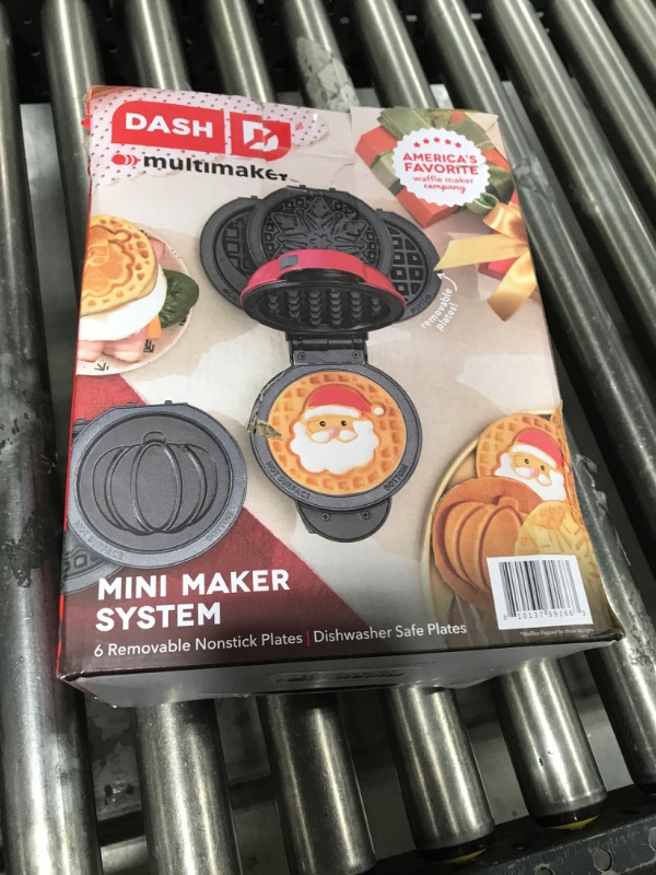 Photo 1 of DASH Holiday Multimaker Mini System - Waffle Maker with Six 4” Removable Holiday Plates: Waffle Iron & Griddle, 4-in-1 Mini Waffle Maker for Kids and Families – Nonstick Surface, Santa Waffle (Red)