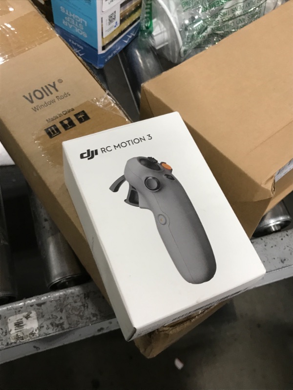 Photo 1 of DJI RC Motion 3, FPV Smart Controller with Immersive Motion Control, Compact and Portable, One-Click Emergency Brake, AR Cursor, Intuitive Drone Controller, Multi-Model Compatibility