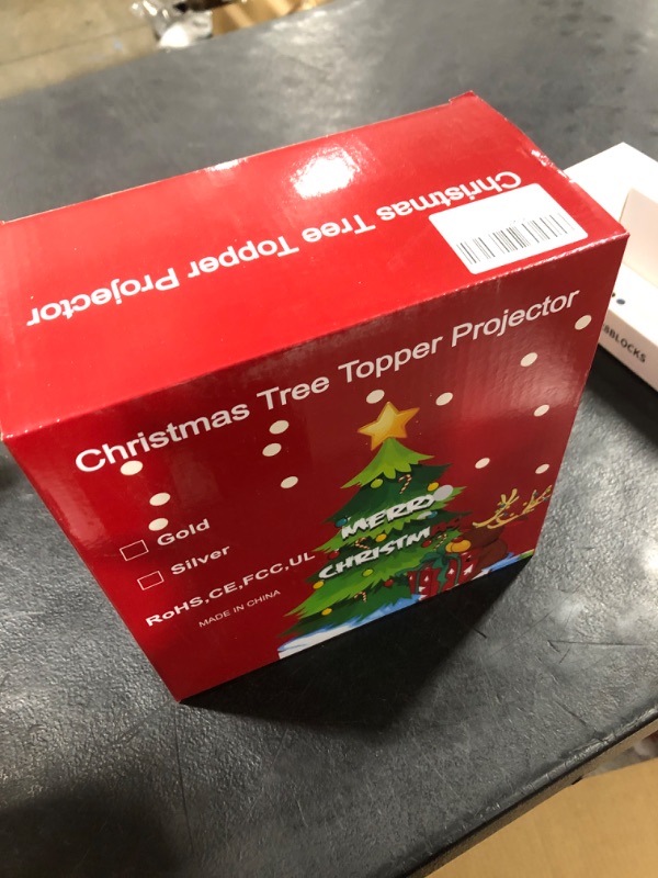 Photo 1 of Christmas Tree Topper Lighted with 4 Pattern Projection Modes, Tree Topper Christmas Decorations Built-in LED Projection Light, 3D Hollow Gold Tree Toppers for Christmas Tree Decorations(Santa Claus)