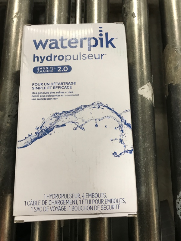 Photo 2 of Waterpik Cordless Advanced 2.0 Water Flosser For Teeth, Gums, Braces, Dental Care With Travel Bag and 4 Tips, ADA Accepted, Rechargeable, Portable, and Waterproof, White WP-580, Packaging May Vary